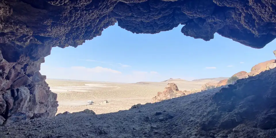 Looking out from inside Hidden Cave near Fallon, Nevada, across the desert basin