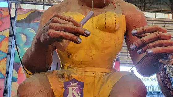 Giant painted float figures inside the Kern Studios workshop at Mardi Gras World