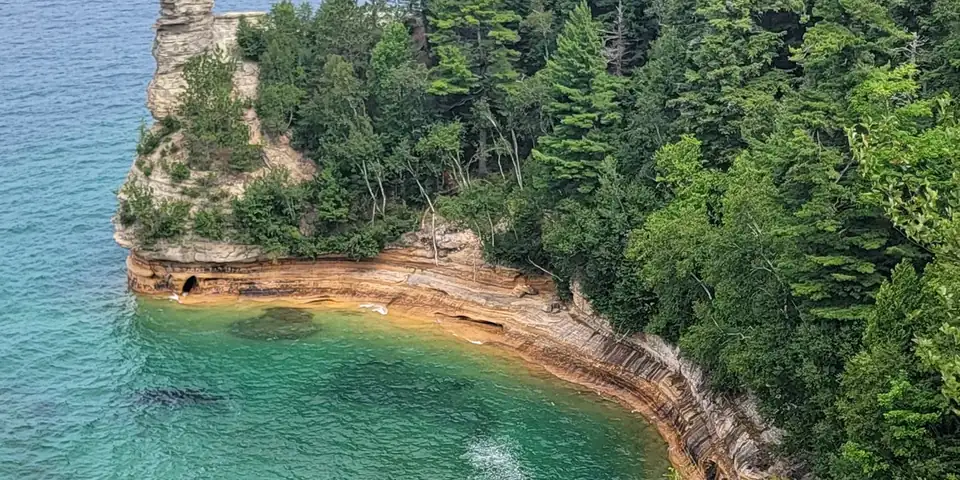 Miners Castle's sandstone turret above the turquoise water of Lake Superior