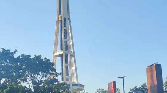 The Space Needle seen from the street and from directly beneath its saucer