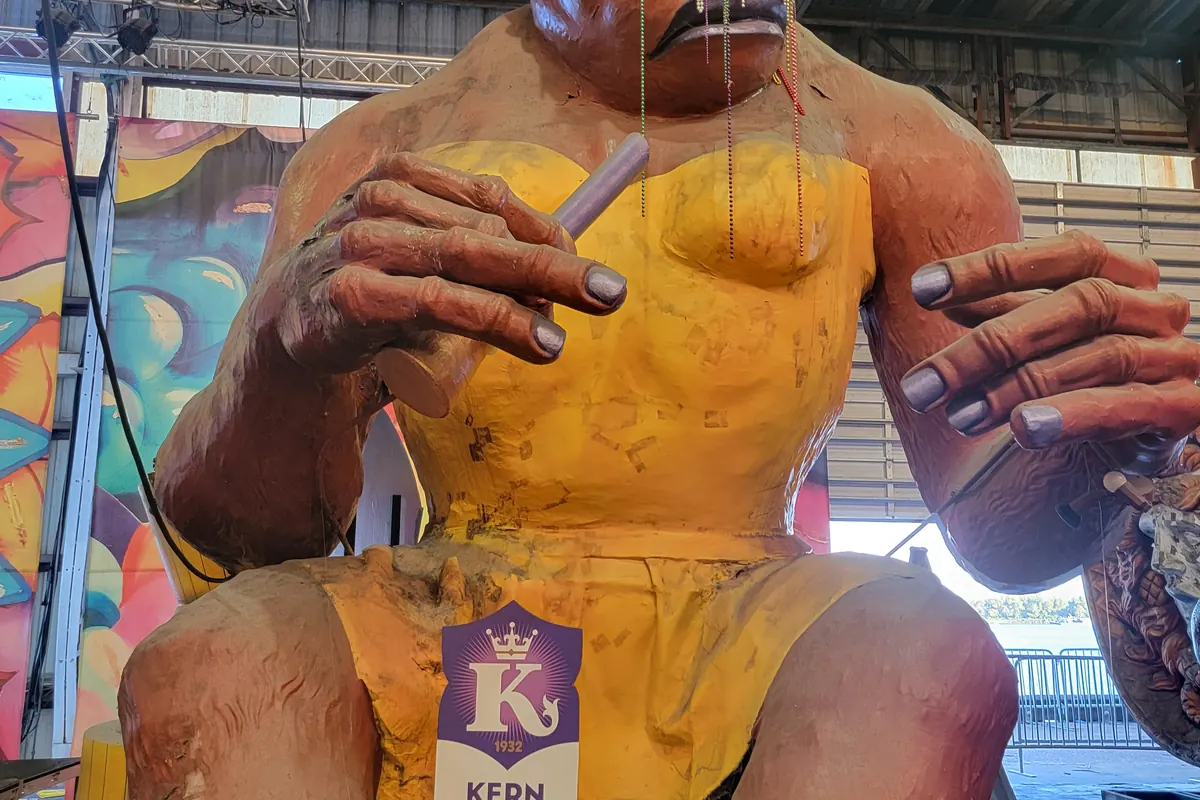 Giant painted float figures inside the Kern Studios workshop at Mardi Gras World