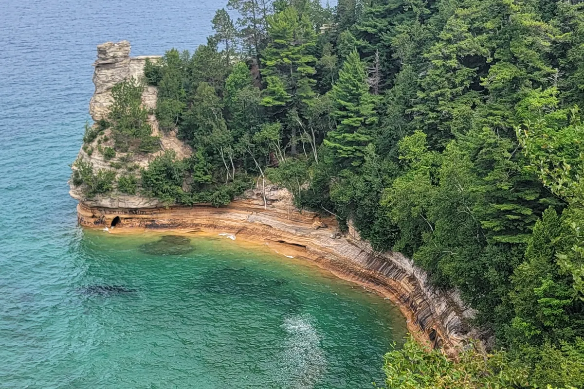 Miners Castle's sandstone turret above the turquoise water of Lake Superior