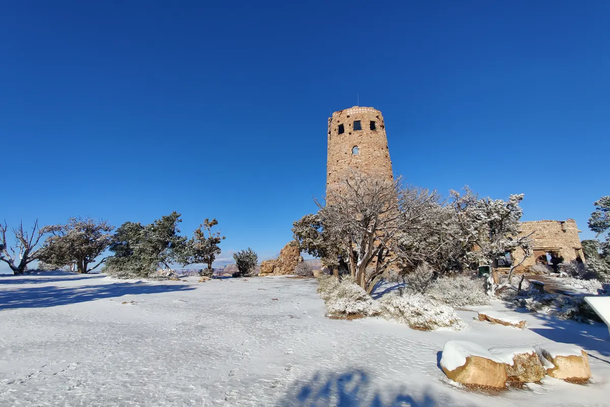 The Desert View Watchtower and a snow-dusted rim at Grand Canyon National Park