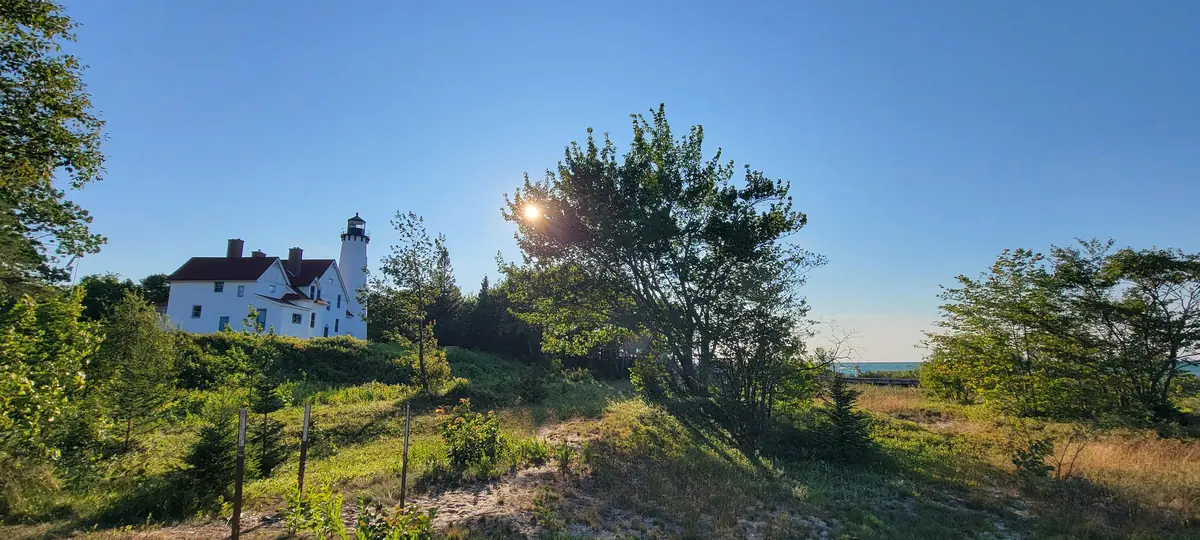 The white keeper's house and tower at Point Iroquois Light Station